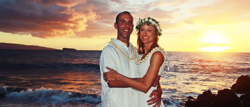 Sunset wedding on Maui beach.